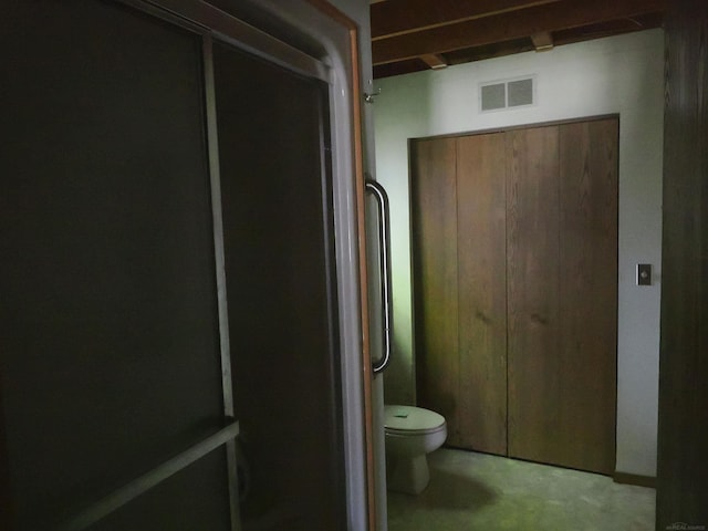 7502 Kauffman Blvd, Presque Isle, MI 49777 - bathroom featuring toilet and a shower with door