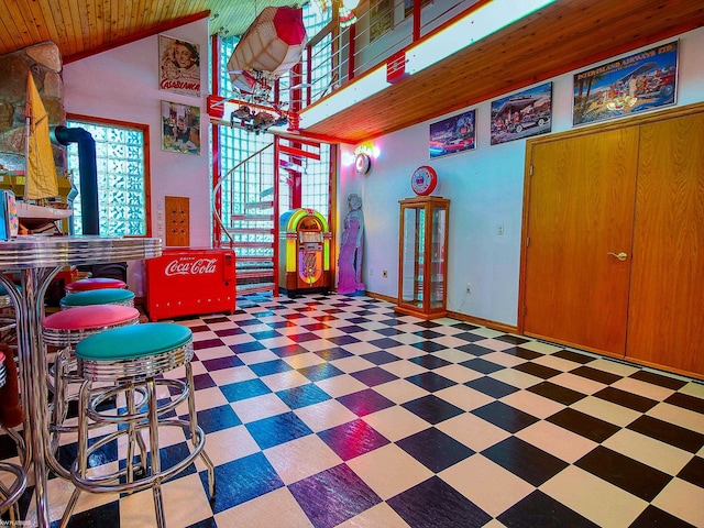 game room with wooden ceiling