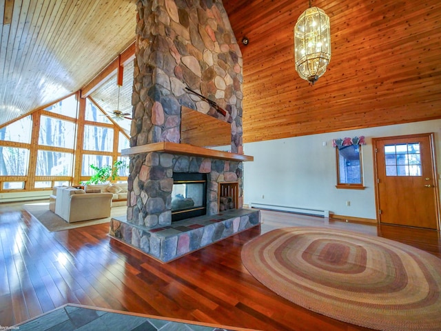 unfurnished living room featuring hardwood / wood-style floors, high vaulted ceiling, ceiling fan with notable chandelier, a fireplace, and beamed ceiling