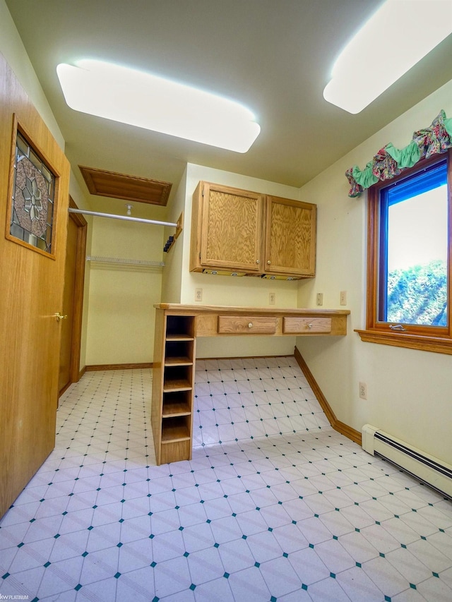 kitchen featuring a baseboard heating unit