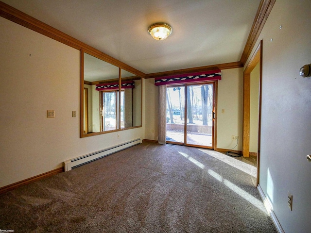 empty room with crown molding, carpet, and a baseboard radiator