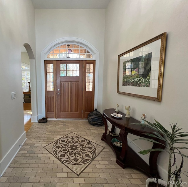 foyer entrance featuring a high ceiling