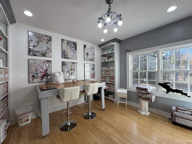 office space featuring recessed lighting, baseboards, and light wood-type flooring