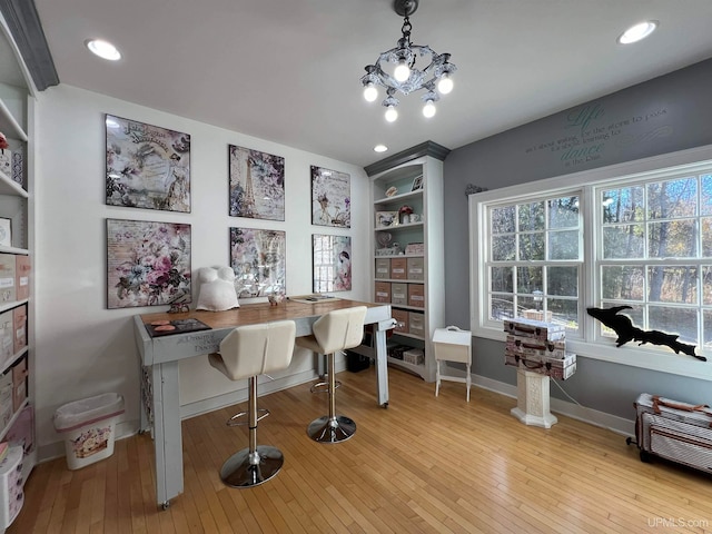 office featuring a notable chandelier and light wood-type flooring