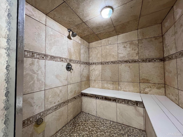 details with a tile shower