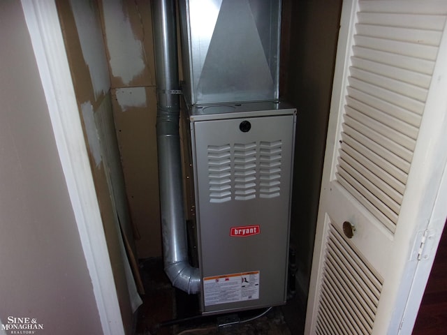 utility room with heating unit