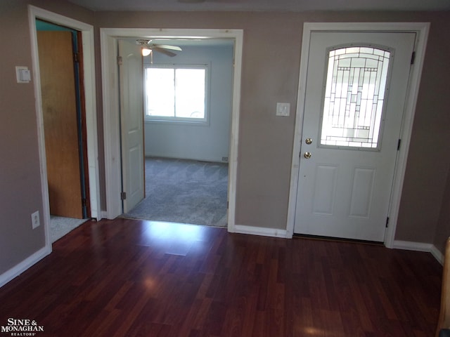 entrance foyer featuring ceiling fan and dark hardwood / wood-style flooring