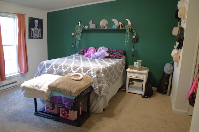 bedroom with crown molding and carpet floors