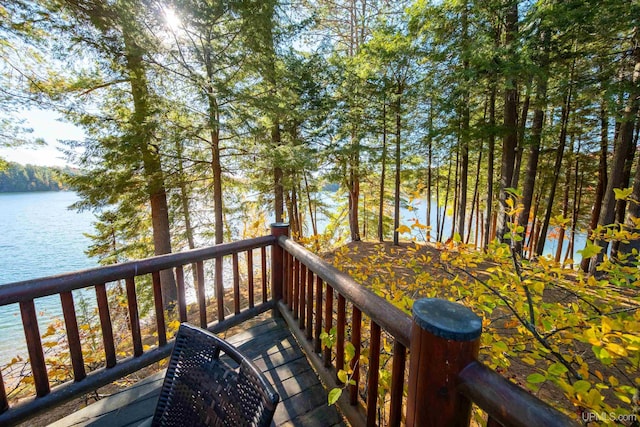 deck featuring a water view