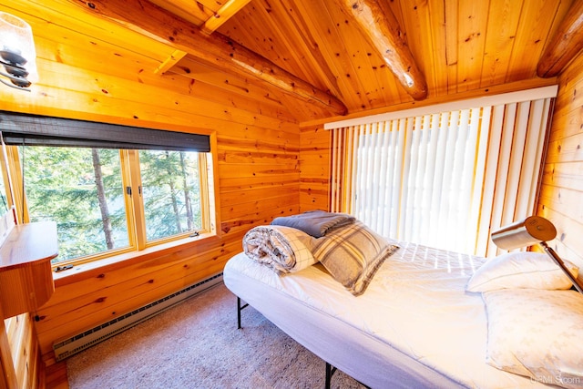 carpeted bedroom with wooden walls, multiple windows, vaulted ceiling with beams, and a baseboard heating unit