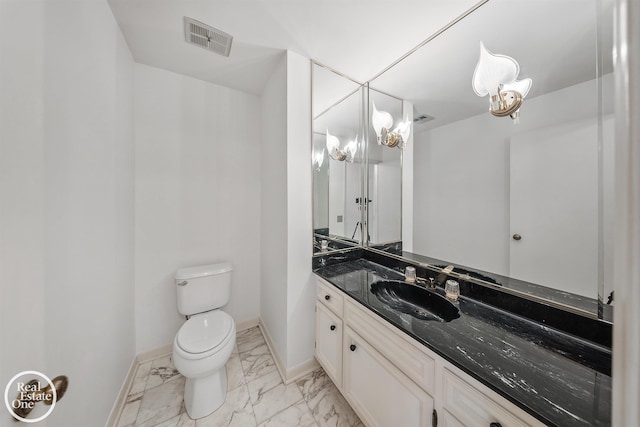 half bath featuring toilet, baseboards, visible vents, marble finish floor, and vanity