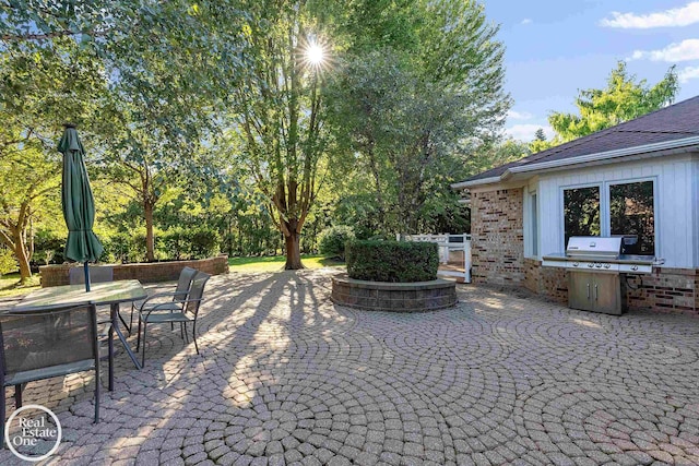 view of patio featuring outdoor dining space