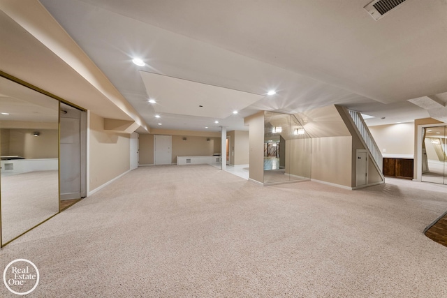 finished basement featuring baseboards, carpet flooring, visible vents, and recessed lighting