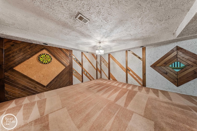 interior space featuring carpet and visible vents