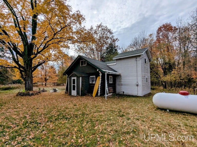 exterior space with a front lawn