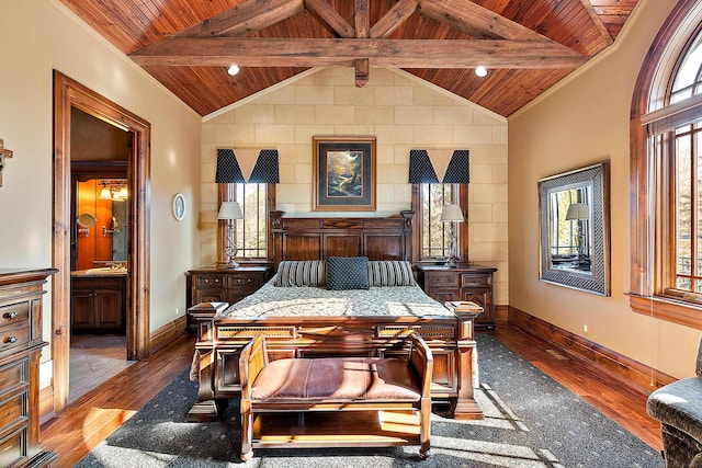 bedroom featuring wood ceiling, lofted ceiling with beams, wood-type flooring, and connected bathroom