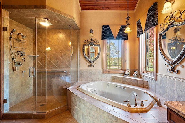 bathroom with vanity, ornamental molding, and plus walk in shower