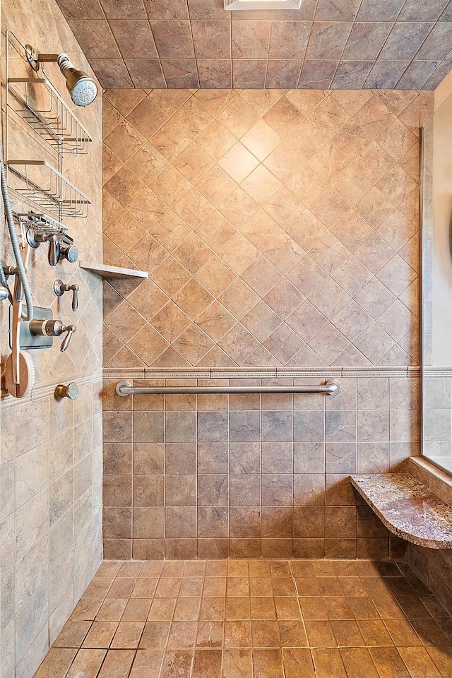 bathroom featuring tiled shower