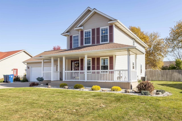 view of front of property with a porch, a front yard, and a garage