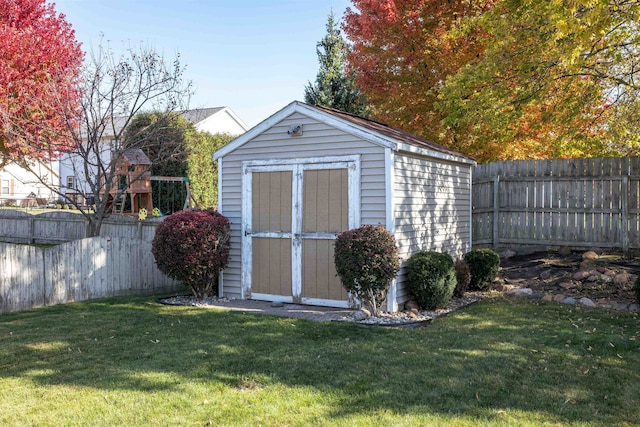 view of outdoor structure with a yard