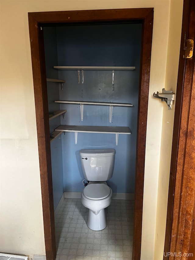 bathroom featuring toilet