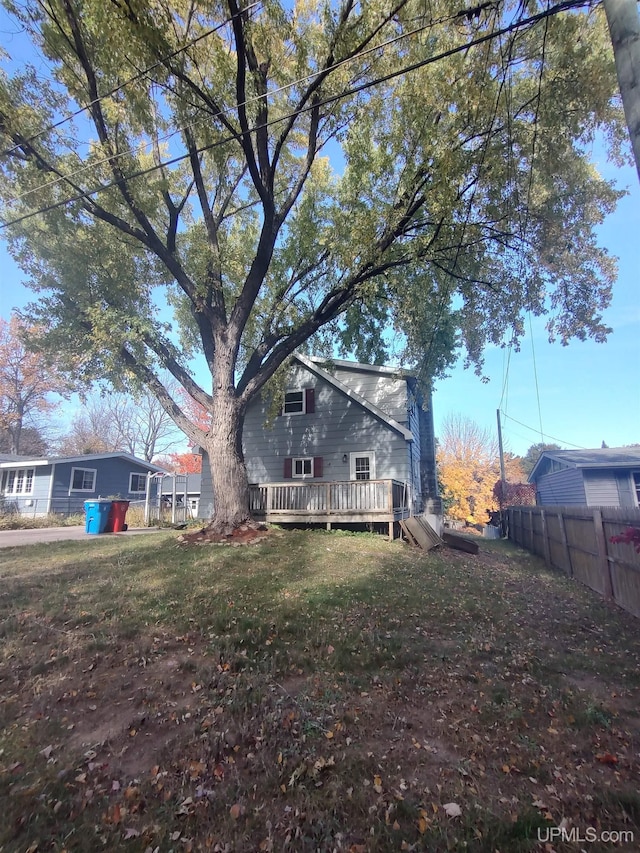 exterior space featuring a wooden deck