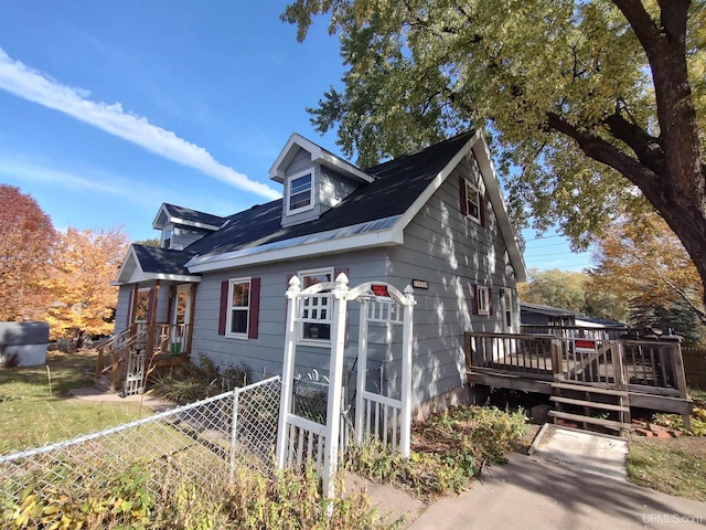 view of front of property with a deck