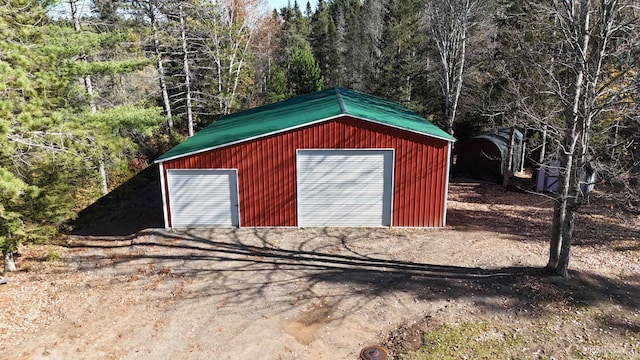 view of outbuilding with a garage