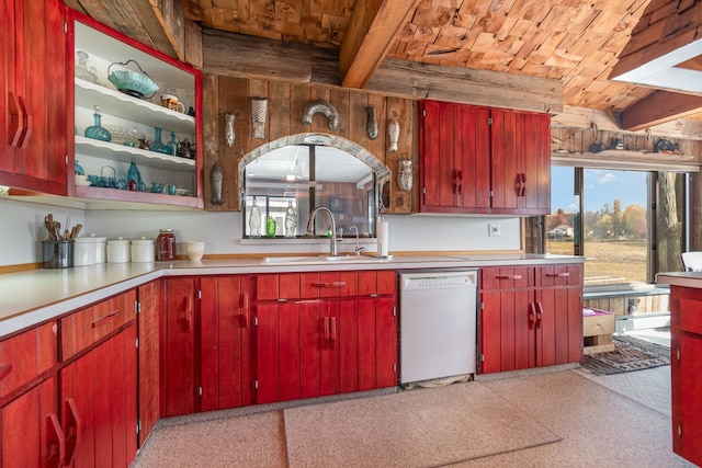 kitchen featuring beam ceiling, white dishwasher, sink, and wooden ceiling