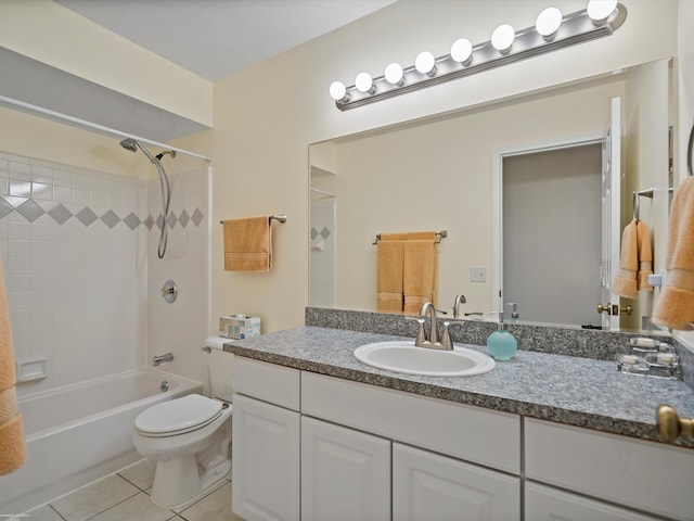 full bathroom with vanity, tiled shower / bath combo, toilet, and tile patterned floors