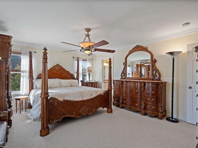 carpeted bedroom with crown molding and ceiling fan