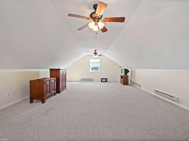 bonus room featuring lofted ceiling, light carpet, and a baseboard radiator