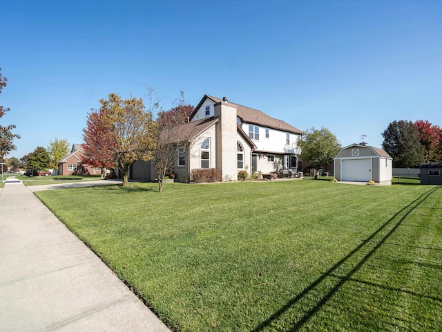 view of home's exterior with a lawn, an outbuilding, and a garage