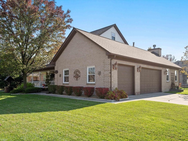 view of property exterior featuring a yard, covered porch, and a garage