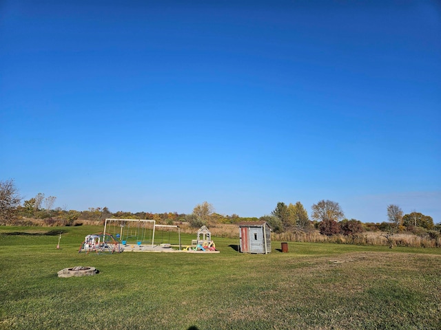 view of yard with a storage shed