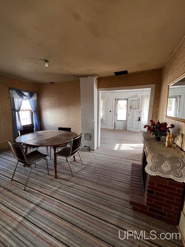 dining room featuring carpet