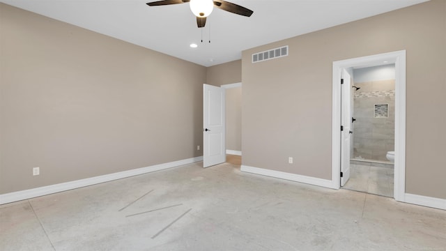 unfurnished bedroom featuring ceiling fan and ensuite bath