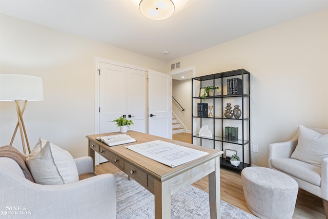 home office with light wood-type flooring