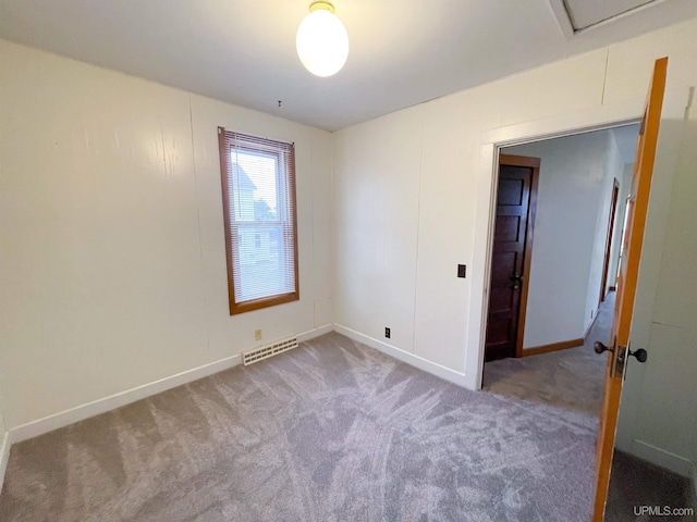 spare room with carpet flooring