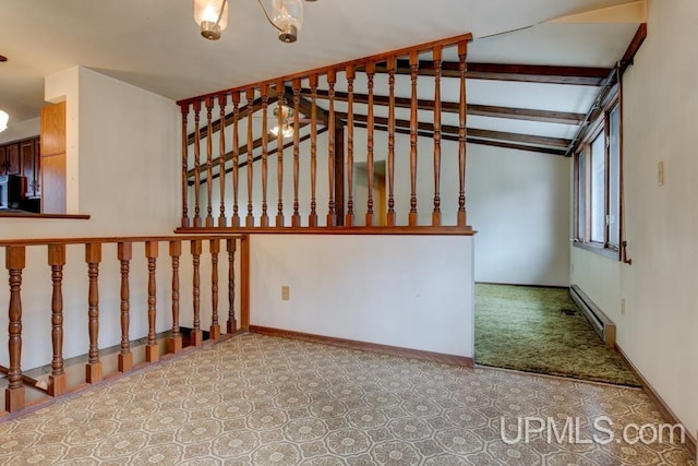 stairs featuring a chandelier and a baseboard heating unit