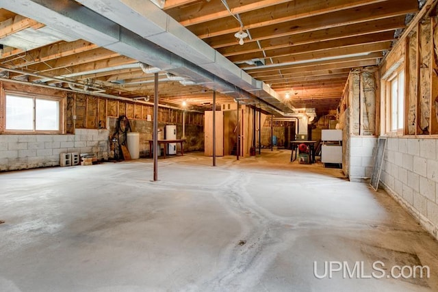 basement featuring water heater