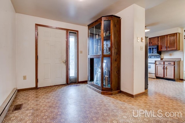 entrance foyer featuring baseboard heating