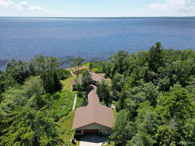 drone / aerial view with a water view