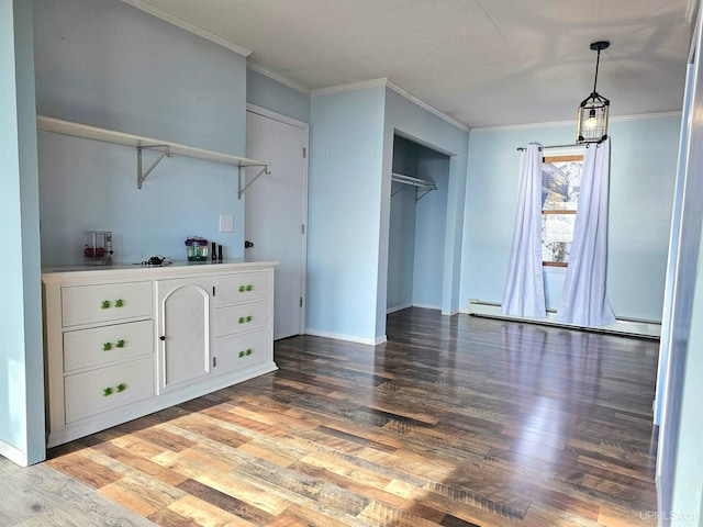 unfurnished bedroom with wood-type flooring, baseboard heating, and crown molding