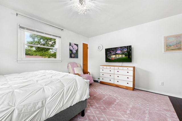 bedroom featuring hardwood / wood-style flooring