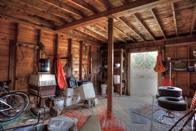 misc room with vaulted ceiling with beams, wood ceiling, and hardwood / wood-style flooring
