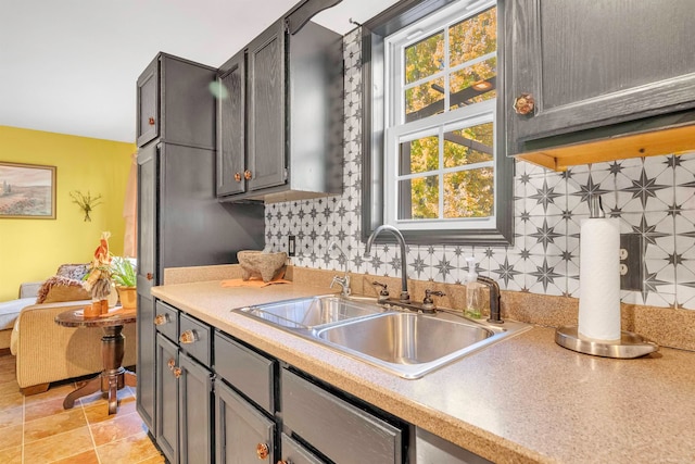 kitchen with decorative backsplash and sink