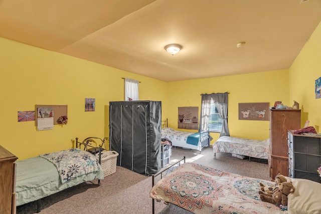 bedroom featuring carpet