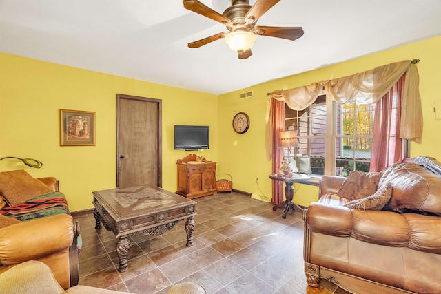 living room with ceiling fan