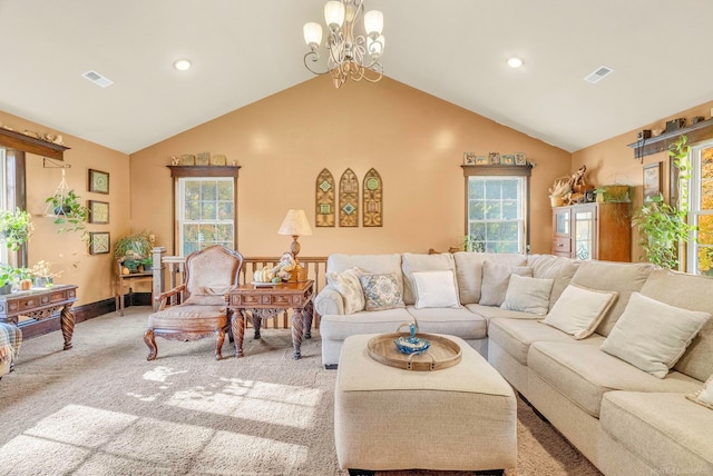 carpeted living room featuring high vaulted ceiling, a healthy amount of sunlight, and a chandelier